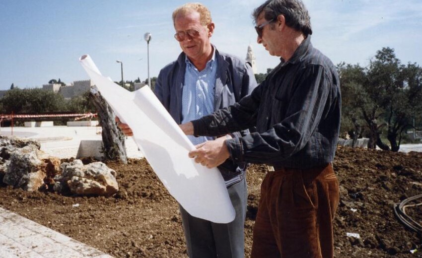 Benjamin Muchawsky reviewing plans on site with the contractor